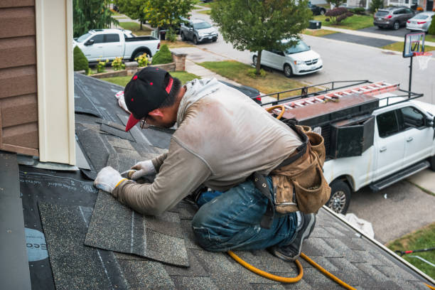 Professional Roofing technician working in Romayor, TX